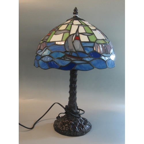 64 - Modern Tiffany style bronzed table lamp with leaded coloured glass mushroom shade.  46cm high approx... 