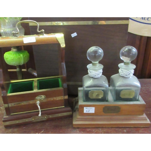 68 - Modern brass mounded decanter box, a tantalus (lacks decanters), together with another open tantalus... 