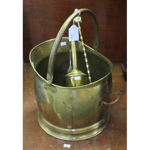 76 - Brass helmet shaped coal scuttle, brass Lincolnshire Imp toasting fork and a brass bottle jack.  (3)... 