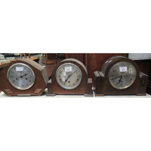 77 - Three mid century oak cased mantle clocks.  (3)  (B.P. 21% + VAT)