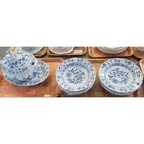 345 - Two trays of continental blue and white 'onion pattern' china to include; various shallow bowls and ... 