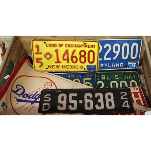 208 - Collection of American sporting and other items to include; USA car tags, original pennants to inclu...