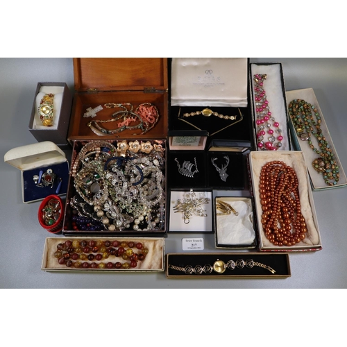 217 - Box of assorted costume jewellery to include; mosiac bangle, necklaces, brooches, dress watches, dre... 