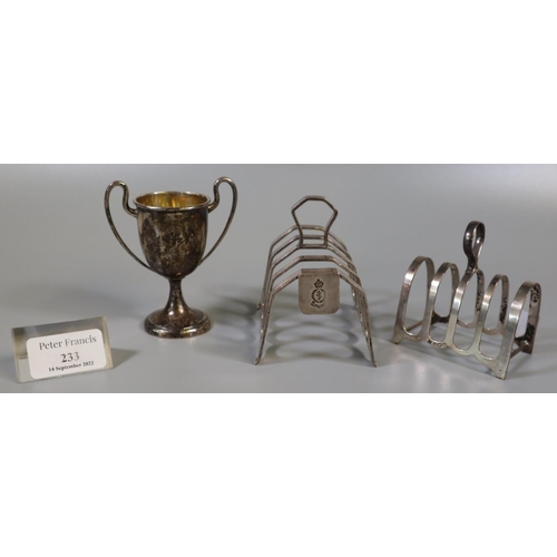 233 - Barton silver miniature two handled trophy cup, together with a silver four section toast rack and a... 