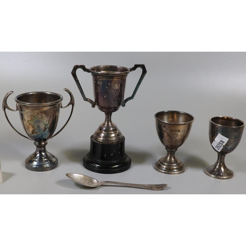 235 - Two similar silver eggcups (1.47 troy ozs approx). Together with a silver teaspoon and two miniature... 