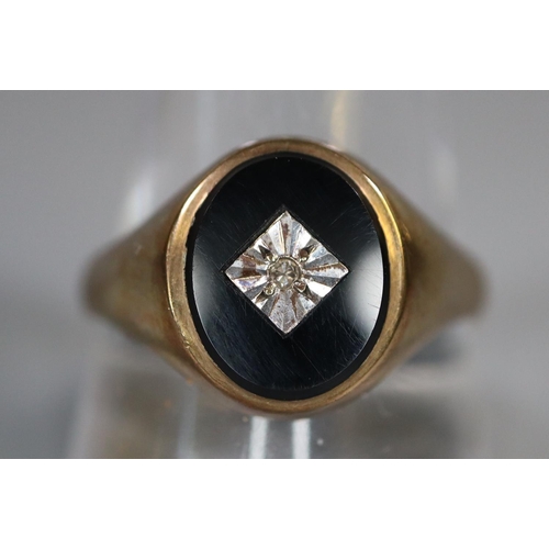 247 - 9ct gold onyx and diamond signet ring. 4.4g approx. Size V.
(B.P. 21% + VAT)