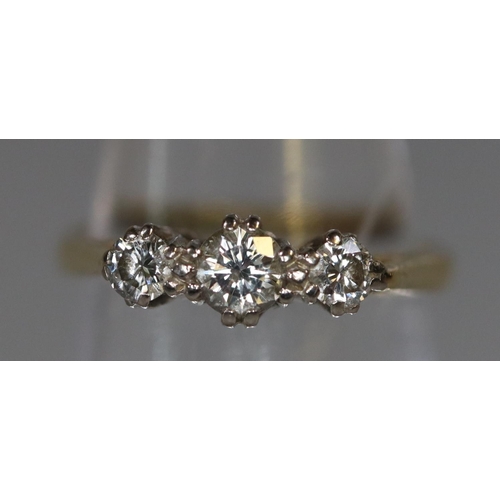 250 - Pretty 18ct gold three stone diamond engagement ring. 2.4g approx, size J. Boxed.
(B.P. 21% + VAT)