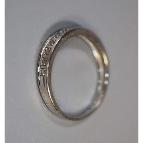 251 - 9ct white gold diamond set half hoop eternity ring. 1.4g approx, size L.
(B.P. 21% + VAT)