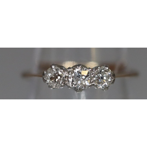 254 - Unmarked three stone diamond engagement ring. 1.4g approx, size I. Boxed. 
(B.P. 21% + VAT)