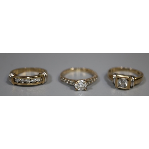 263 - Three 9ct gold rings set with white stones. 6.3g approx. 
(B.P. 21% + VAT)