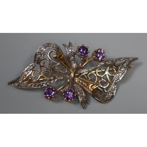 266 - 9ct gold amethyst and diamond floral spray and handkerchief brooch. 
(B.P. 21% + VAT)