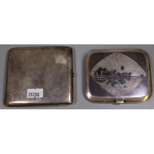 273 - Niello silver North African origin cigarette case decorated with desert scenes, together with a silv... 