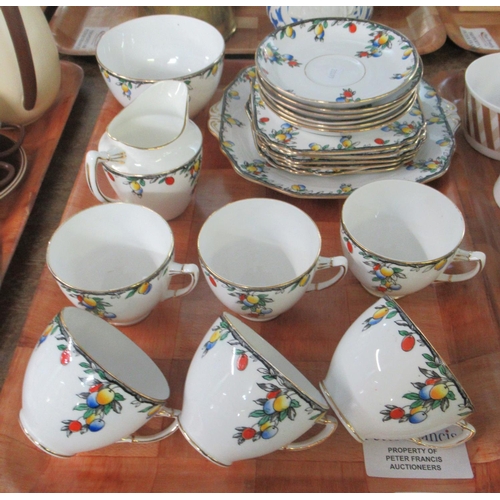 353 - Wetley china English teaware with fruit design to include; teacups and saucers, various plates, milk... 