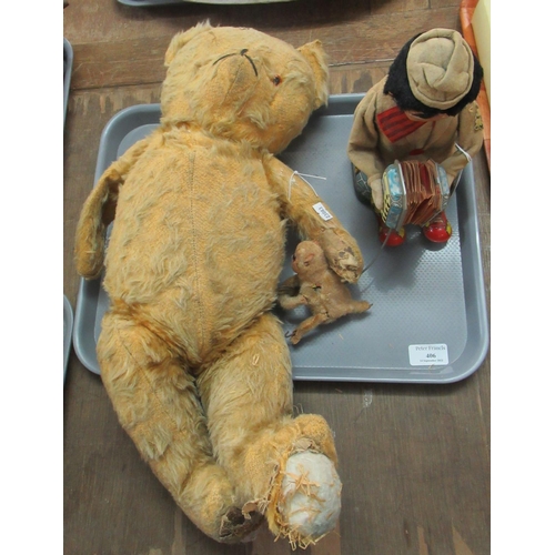 406 - Early 20th Century mohair teddy bear with movable limbs and stitched nose, together with a Japanese ... 