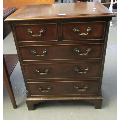 434 - Reproduction mahogany straight front chest of two short and three long drawers on a projecting base ... 