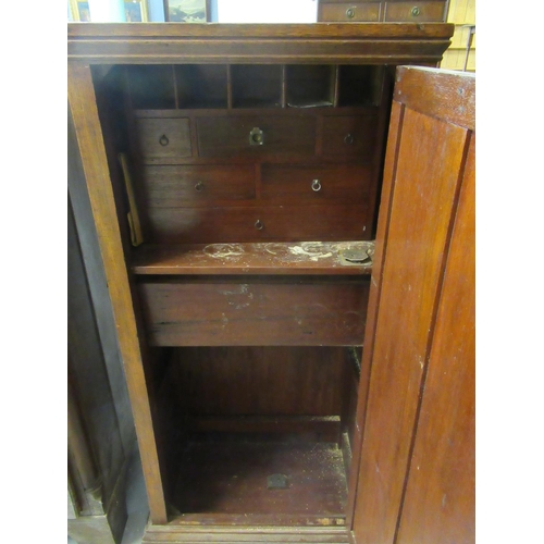 441 - Early 20th Century mahogany single door free standing cupboard, the interior revealing a bank of six... 