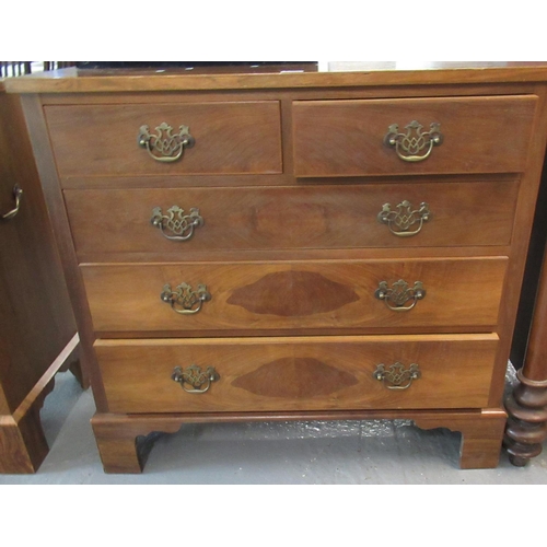 444 - 20th Century walnut straight front chest of two short and three long drawers, with brass carrying ha... 