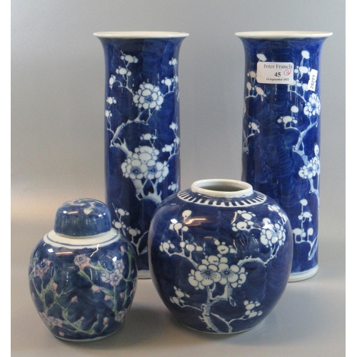 45 - Pair of Chinese blue and white cylinder vases decorated with prunus blossom, together with similar g...