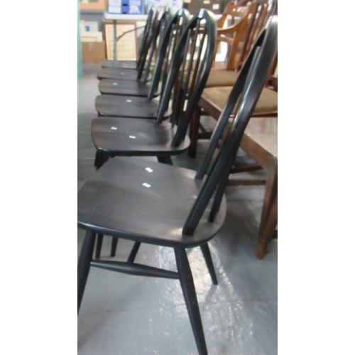 452 - A set of six mid 20th century black ebonised finish beech and ash hoop and stick backed dining chair... 