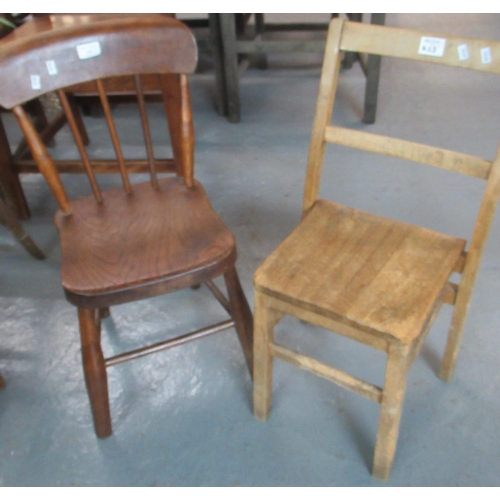 453 - Early 20th Century elm spindle back child's chair, together with another beech bar back child's chai... 