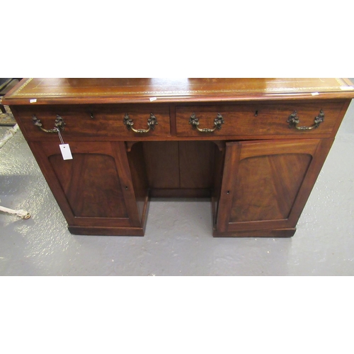 489 - Victorian mahogany knee hole desk, the leather inset and moulded top above two drawers with brass ha... 