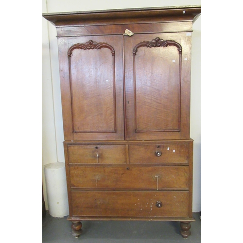 494 - 19th Century Welsh oak two stage press cupboard, the moulded cornice above two blind panelled doors,... 