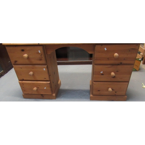 499 - Modern natural pine two pedestal knee hole desk, with three fitted drawers to each side.  145cm wide... 