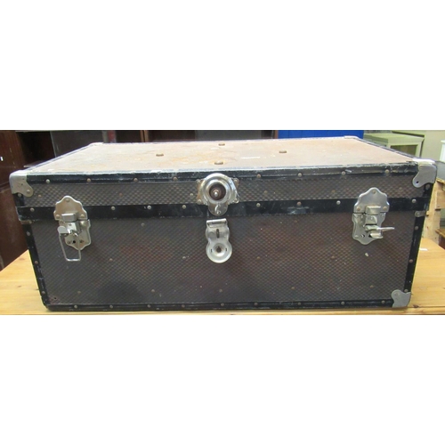 500 - Vintage canvas and metal banded travelling trunk.
(B.P. 21% + VAT)