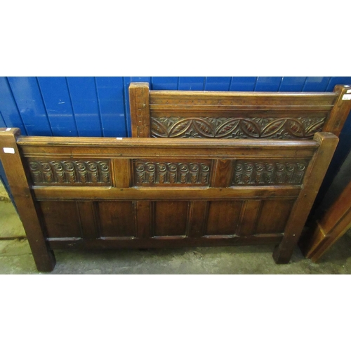 502 - Two reproduction 17th century style oak bedheads.  91cm and 1.35m approx.  (2)  (B.P. 21% + VAT)