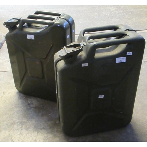 516 - Two metal jerry cans, one military with arrow dated 1987. (2)
(B.P. 21% + VAT)