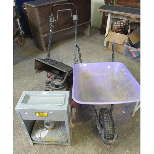 521 - A garden wheelbarrow together with an Eltex greenhouse heater and a Mountfield lawn mower in very di... 