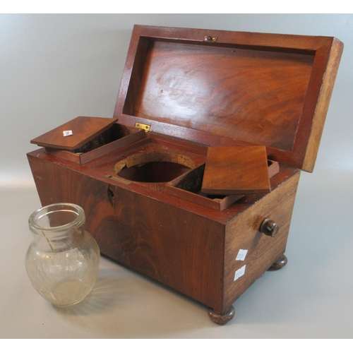 73 - 19th Century mahogany sarcophagus shaped tea caddy on pad feet. 
(B.P. 21% + VAT)