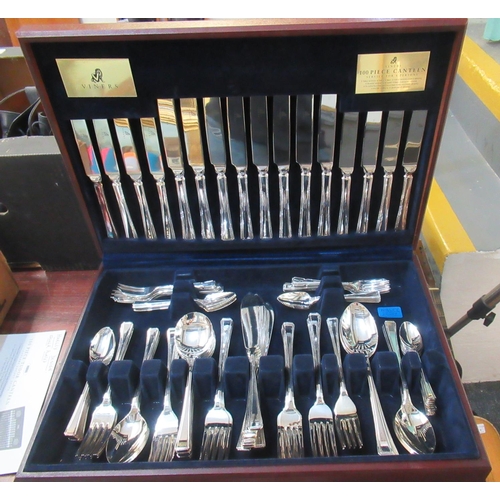 92 - Cased mahogany finish canteen of 'Tudor' silver plated cutlery.
(B.P. 21% + VAT)