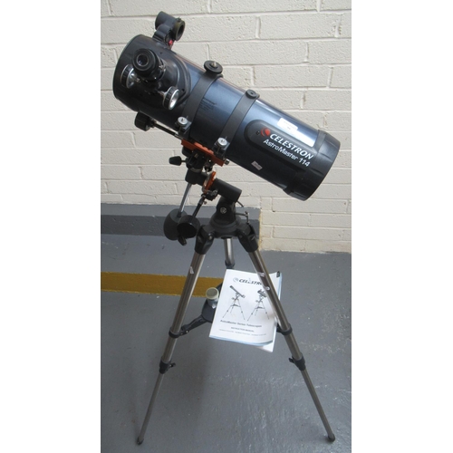 99 - Modern AstroMaster 114 Celestron Newtonian telescope on stand. 
(B.P. 21% + VAT)