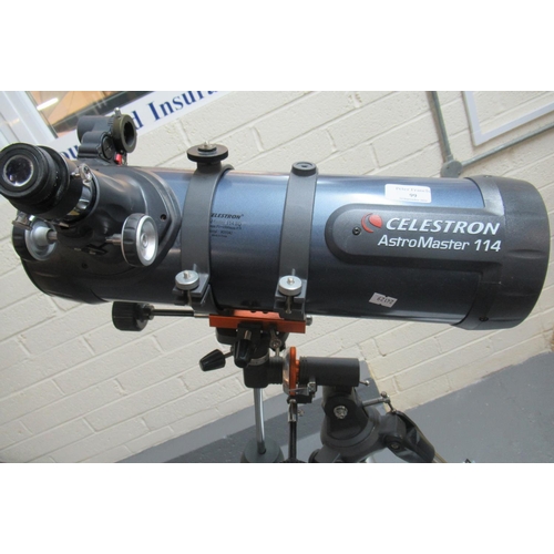 99 - Modern AstroMaster 114 Celestron Newtonian telescope on stand. 
(B.P. 21% + VAT)