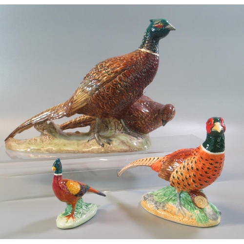 11 - Beswick 2078 pheasant group on naturalistic base, together with a John Beswick study of a pheasant a... 