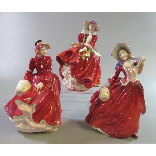 174 - Three Royal Doulton bone china figurines, to include: 'Louise', 'Autumn Breezes' and 'Top O' The Hil... 