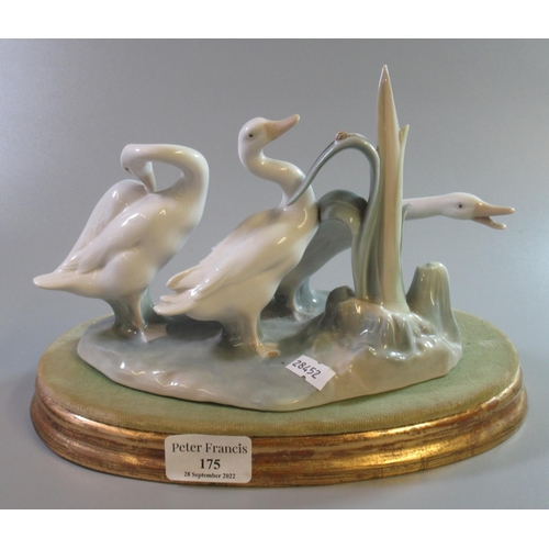 175 - Lladro Spanish porcelain figure group of three geese on reeds and naturalistic and wooden gilded bas... 