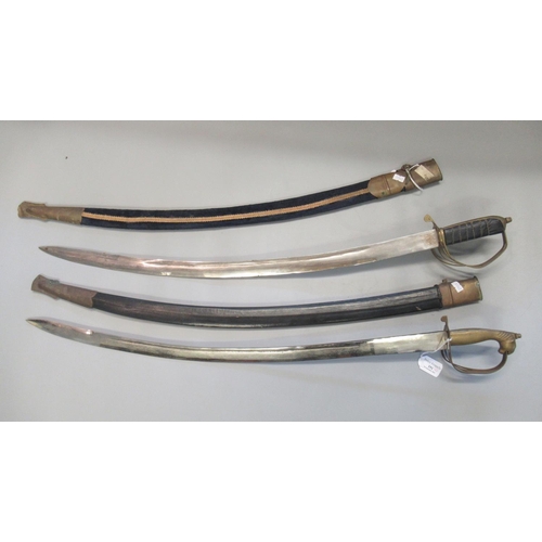 191 - Two Indian Tulwar brass hilted steel bladed ceremonial swords with scabbards. (3)
(B.P. 21% + VAT)