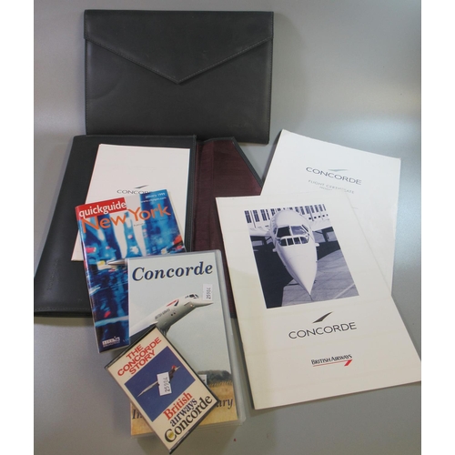 193 - Two Concorde souvenir flight wallets containing ephemera, pen etc. Together with a video of 'Concord... 