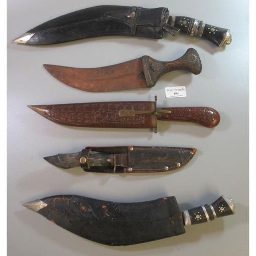 194 - Two Nepalese Kukri and three other knives, Middle Eastern etc. (5)
(B.P. 21% + VAT)