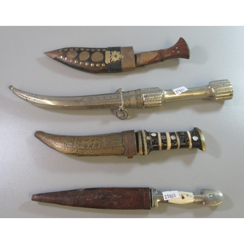 196 - Collection of Moorish daggers and others, Kukri type dagger, all in scabbards.
(B.P. 21% + VAT)