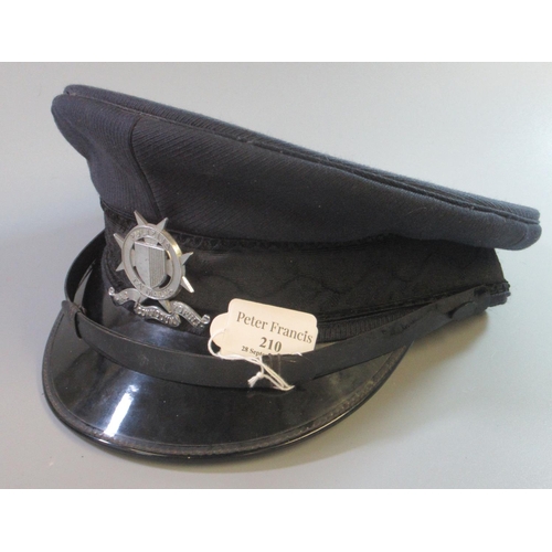 210 - Maltese police officer's cap with cast metal badge.   (B.P. 21% + VAT)