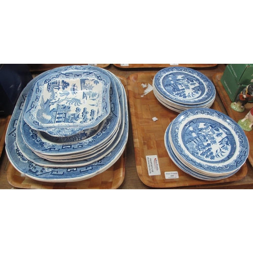 359 - Two trays with blue and white willow pattern plates, meat plates and square dish (various). (2)
(B.P... 