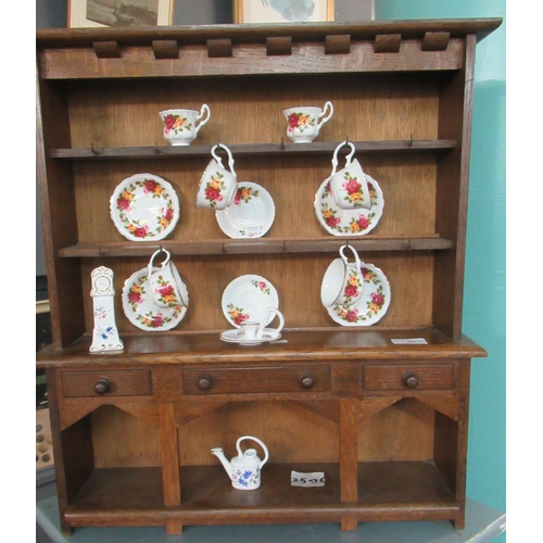 400 - 19th century style oak miniature rack back pot board dresser with assorted miniature china teaware. ... 