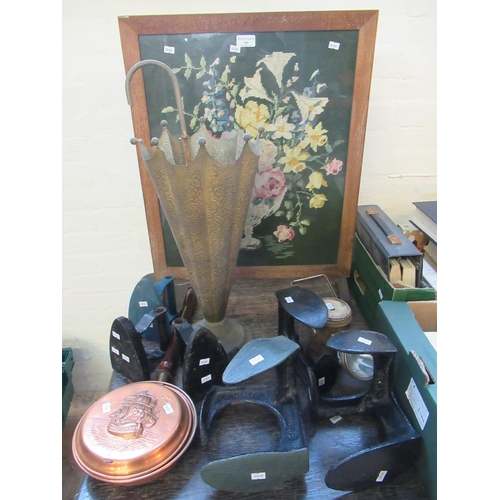 506 - Assorted items to include: three flat irons, three shoe lasts, umbrella stand, firescreen, hand torc... 