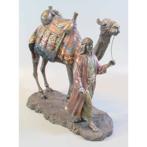 51 - Bronzed composition study of an Arab man leading his camel, on a naturalistic base.  Modern.  21cm l... 