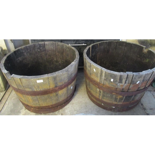 517 - Two coopered half barrel wooden garden planters. 63cm diameter approx. (2)
(B.P. 21% + VAT)