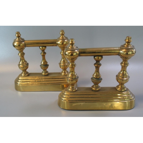 60 - Pair of 19th century cased brass and cast iron andirons.   19cm wide approx.  (2)  (B.P. 21% + VAT)