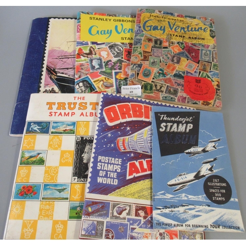 69 - Collection of all world stamps in six junior type albums.  100s of stamps.  (B.P. 21% + VAT)